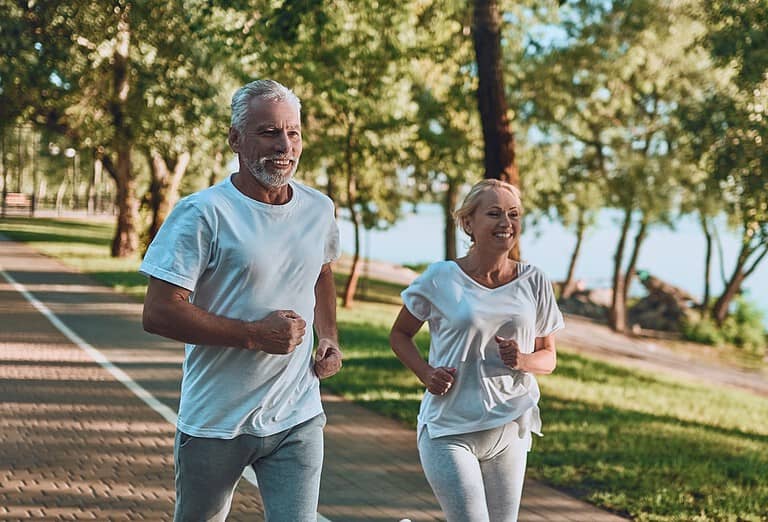 Happy, healthy and sporty aging couple